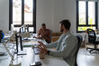 © Alba Vitta/Stocksy - coworkers teamwork office