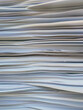 © Rene de Haan/Stocksy - stack of white paper