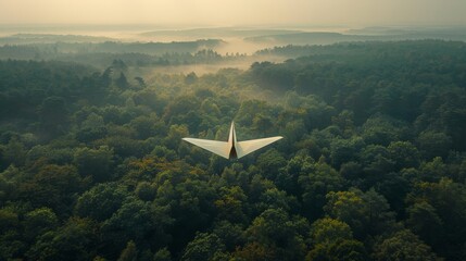 Wall Mural - A white paper plane flies over forest, overlooking the craterï¼Œaerial view, long distance, real photos 