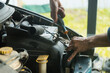 © Ivan Andrianov/Stocksy - Fix The Car Outdoor Local Garage