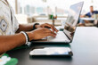 © Marco Govel/Stocksy - Hands typing on a laptop