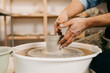 © Artem Podrez/Stocksy - Close-up Hands Molding Clay on Spinning Wheel