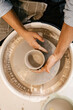 © Artem Podrez/Stocksy - Close-up Hands Molding Clay on Spinning Wheel