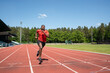 © Hernandez & Sorokina/Stocksy - Black Athlete Running In Stadium