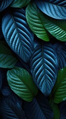 the leaves of the plant are blue and green.