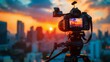 © Janejira - Modern DSLR on a sturdy tripod filming the sunset over a bustling cityscape, creating a dreamy atmosphere with colorful bokeh