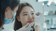 © weerawat - Create a realistic and detailed digital artwork of a cosmetic procedure being performed in a modern clinic. Focus on a young woman receiving a precise treatment from a skilled professional.
