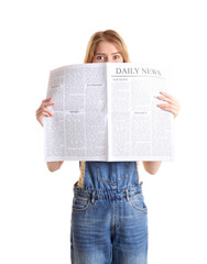 Wall Mural - Young woman covering her face with newspaper on white background