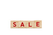© Wongsakorn - Red SALE word wooden blocks of business concept isolated on white background. Copy space and Clipping Path. Financial, Economic, Business, Marketing.