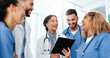© CoetzeeRising/peopleimages.com - Doctor, nurse and team work on tablet for healthcare research, workflow or happy collaboration in residency training. Medical people on digital technology for clinic software solution and group laugh