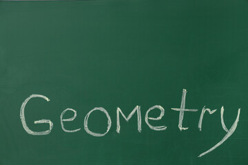 Wall Mural - Word GEOMETRY written on green chalkboard