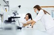 © zorandim75 - Scientists collaborating on research in a laboratory setting