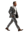 © santima - full figure side view of businessman walking