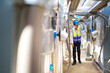 © offsuperphoto - Engineer or technician checking air conditioner control valve at plumbing systems
