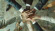 © suldev - Business team putting their hands together, top view