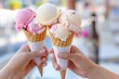 © DeepMind - Close-up Of Hands Holding Ice Cream Cones Outdoors