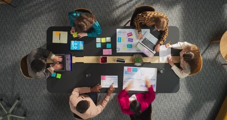 Aufkleber - Top Down View In Timelapse: Diverse Team of Professionals in a Corporate Office Space Brainstorming and Analyzing Data. Businesspeople Collaborate on Digital Projects Using Laptops and Tablets.