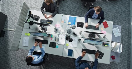Aufkleber - Top Down View of Diverse Team in a Corporate Office, Working on Desktop Computers And With Financial Documents. Colleagues Working Creating Reports, Developing Business Strategies For Hedge Fund.