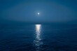 © dip - A serene moonlit night over the calm waters of an ocean, with reflections of the full moon on gentle waves.
