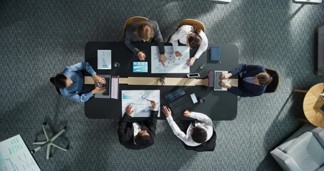 Aufkleber - Diverse Professionals Working on Business Statistics Reports and Marketing Plans in an Office. Top Down View Of Discussion and Financial Data Analysis on Laptops and Charts. Teamwork And Innovation.