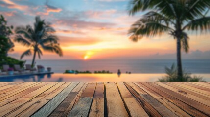 Wall Mural - Scenic wooden table with blurred background of pool sea people palm tree and sunset sky