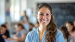 © Kenny - Smiling Female Teacher in Classroom with Students