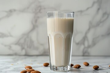 Poster - A glass of milk is sitting on a marble countertop