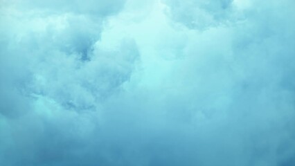 Wall Mural - flying passing soft cloud in loop. passing soft clouds in a seamless loop background.