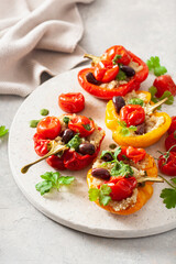 Wall Mural - stuffed bell peppers with quinoa tomatoes olives and herb sauce chimichurri