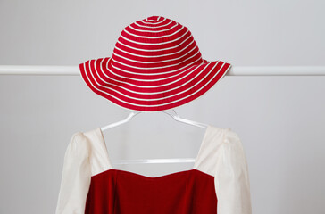 Sticker - red hat with vintage dress on white background