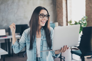 Sticker - Photo of lucky good mood lady agent dressed jeans shirt winning game modern gadget indoors workplace workstation loft