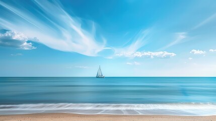  A calm beach with a distant sailboat and space for text.