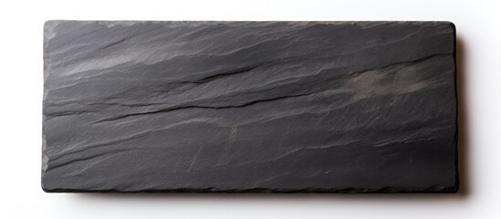 Aufkleber - Black stone slate board on a white surface with a texture perfect for copy space image.