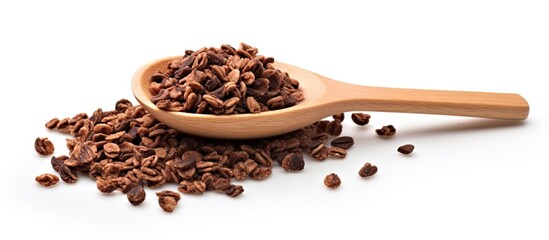 Aufkleber - A wooden spoon holds chocolate granola cereal with nuts, displayed against a white background, creating a clean scene with copy space image.