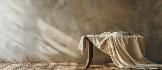 Poster - Tablecloth draping wooden table with copy space image.