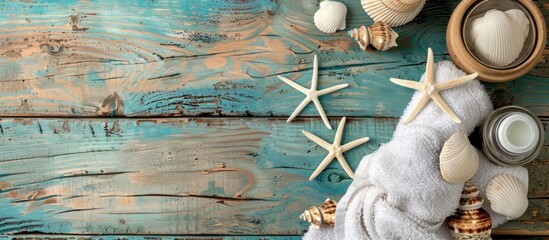 Wall Mural - Beach essentials displayed on a rustic wooden surface with copy space image.