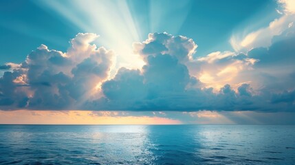 Wall Mural - Dramatic sky with sunbeam and clouds above the Indian Ocean