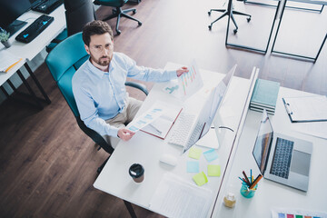 Canvas Print - Above view photo of successful elegant man hold papers wear shirt loft interior modern office indoors