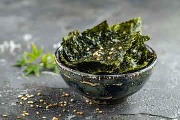 Poster - Crispy nori seaweed traditional Japanese snack on grey background