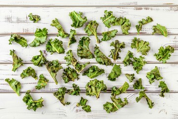 Sticker - Delicious kale chips on wooden table top view