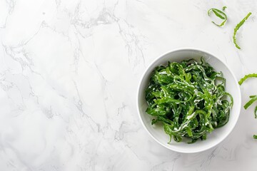 Sticker - Delicious seaweed salad on white marble background top view for text