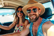 © VetalStock - Couple on vacation on the roadtrip having fun driving