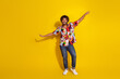© deagreez - Full length portrait of nice young man good mood dance wear shirt isolated on yellow color background