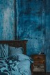 © Iigo - Blue grunge bedroom with wooden bed and blue wall.