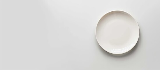 Aufkleber - Top view of an empty plate on a white background with copy space image.
