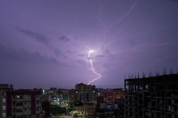storm, lightning over city in monsoon in night, danapur, patna, bihar, india