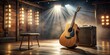 © Man888 - A classic acoustic guitar leans against a rustic wooden amp surrounded by scattered sheet music and dimly lit stage spotlights in a cozy empty concert venue.