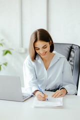 Sticker - Woman Signing Documents at Office Desk