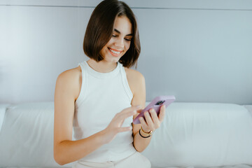 Poster - Woman Smiling While Using Smartphone