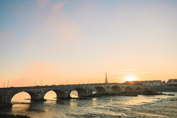 Canvas Print - A stone bridge at sunset in tours